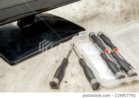 Closeup view of screwdriver set on the box for repairing electronic goods on the table 119957792