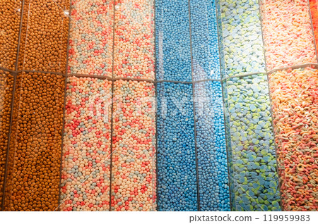 Colorful Candy Dispensers in a Sweet Shop 119959983