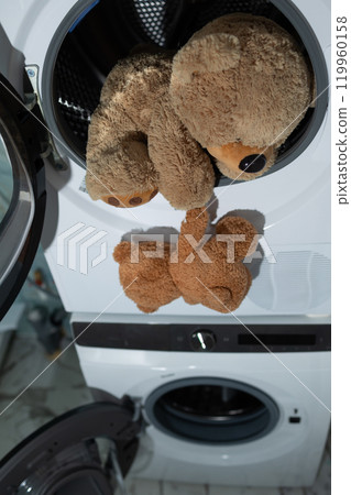 Stuffed Animals Nestled in the Dryer A Cozy Laundry Moment Filled with Comfort and Joy Stuffed Animals Nestled in the Dryer A Cozy Laundry Moment Filled with Comfort and Joy 119960158