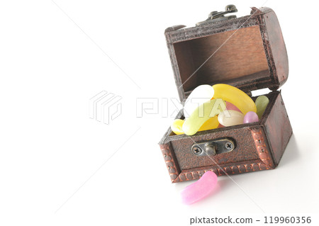 Jelly beans in a treasure chest photographed on a white background Jelly beans in a treasure chest photographed on a white background 119960356