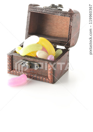 Jelly beans in a treasure chest photographed on a white background Jelly beans in a treasure chest photographed on a white background 119960367