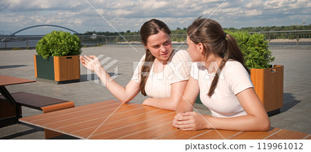 Girls look at people with disapproval Girls look at people with disapproval 119961012