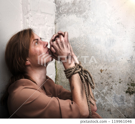 The bound prisoner sit on the floor The bound prisoner sit on the floor 119961046