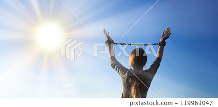 Tied hands raised to the sky Tied hands raised to the sky 119961047