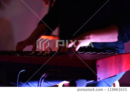 Hands of keyboard player musician playing live Hands of keyboard player musician playing live 119961633