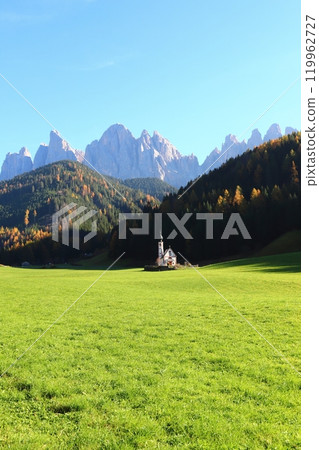 St. John's Church and the Geisler Mountains in a Dolomite meadow (1) St. John's Church and the Geisler Mountains in a Dolomite meadow (1) 119962727