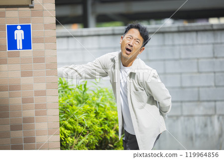 Public toilet and middle-aged man Public toilet and middle-aged man 119964856