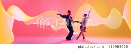 Male and female dancers performing Latin dance in stylish clothes against gradient pink yellow background in neon light with abstract dynamic elements. Male and female dancers performing Latin dance in stylish clothes against gradient pink yellow background in neon light with abstract dynamic elements. 119965616