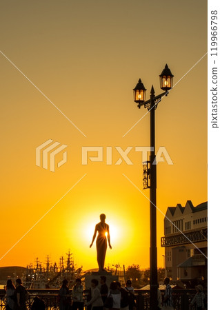 Watching the sunset at Nusamai Bridge 119966798