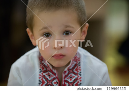 Portrait of a small Belarusian or Ukrainian boy in embroidery Portrait of a small Belarusian or Ukrainian boy in embroidery 119966835