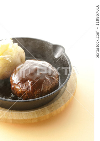 Hot hamburger steak and hot buttered potatoes Hot hamburger steak and hot buttered potatoes 119967016