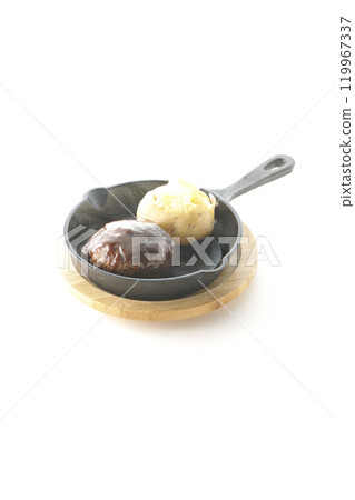 Hot hamburger steak and hot buttered potatoes photographed on a white background Hot hamburger steak and hot buttered potatoes photographed on a white background 119967337