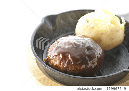 Hot hamburger steak and hot buttered potatoes photographed on a white background 119967349