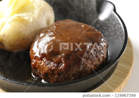 Hot hamburger steak and hot buttered potatoes photographed on a white background 119967399
