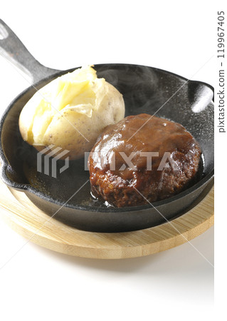 Hot hamburger steak and hot buttered potatoes photographed on a white background 119967405