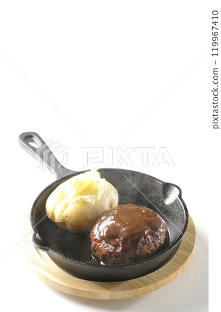 Hot hamburger steak and hot buttered potatoes photographed on a white background 119967410