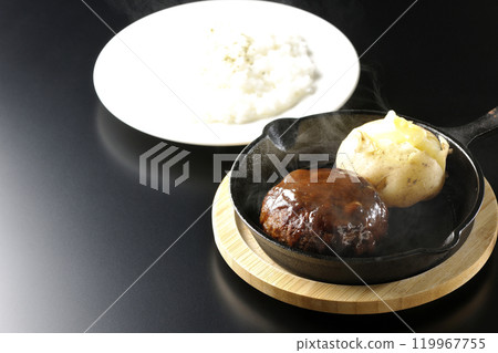 A set of hot hamburger steak, hot buttered potatoes and rice 119967755