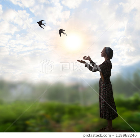 Young girl praying to God Young girl praying to God 119968240