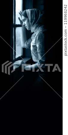 Girl at the window Girl at the window 119968242