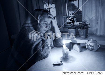 Woman with candles. Power outage in Kyiv Woman with candles. Power outage in Kyiv 119968268