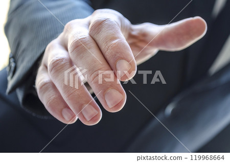 Detail of a man extending hand Detail of a man extending hand 119968664