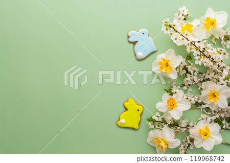 Spring flowers and Easter eggs and bunnies 119968742