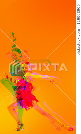 Latin dancer in passionate pose, dancing with energy, overlaid with red, orange, and green colors. Movement and rhythm. 119968909