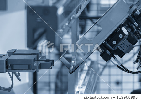 High technology bending machine  operation with robotic system in the light blue scene. 119968993