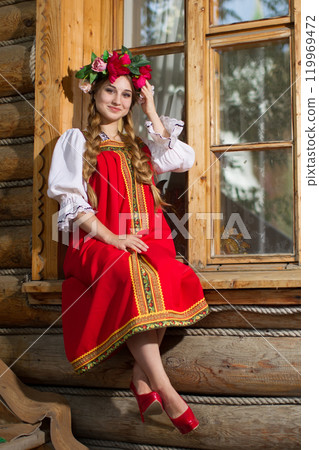 Beautiful Russian Slavic girl in national dress. Beautiful Russian Slavic girl in national dress. 119969472