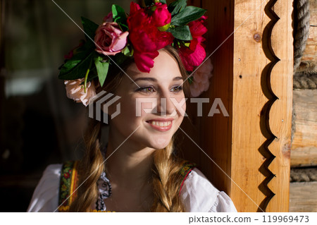 Beautiful Russian Slavic girl in national dress. 119969473