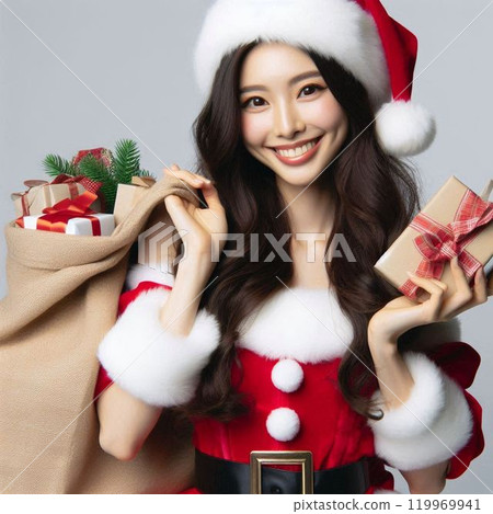 A woman wearing a Santa costume handing out presents at an event A woman wearing a Santa costume handing out presents at an event 119969941