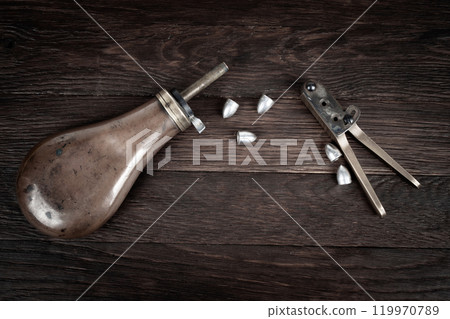 old west bullet mold with bullets and powder flask 119970789