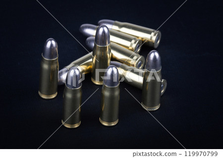 Ammunition on black. 119970799