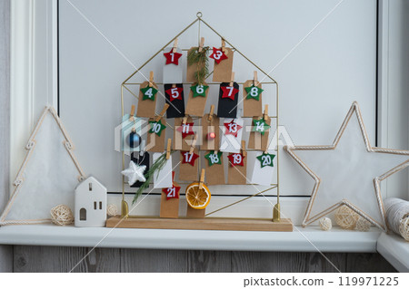 Traditional twenty four days advent calendar before Christmas holidays. Plastic free zero waste sustainable decoration. Winter cozy home Catholic traditions of Christmas countdown new year 119971225
