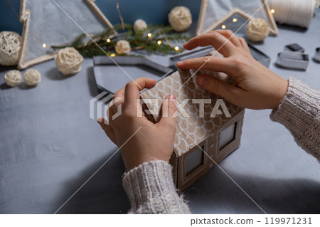 Cardboard paper Lantern House Sustainable Christmas preparation Diy process of making handmade. Step by step activity for children. Inclusive and responsible stress relief holiday hobby 119971231