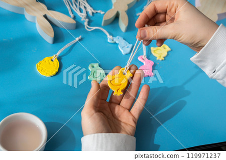 Children air dry clay activity handicraft idea. DIY process step by step instruction. Preparing for Easter holiday decorating. Modern organic design minimalistic plastic free sustainable Children air dry clay activity handicraft idea. DIY process step by step instruction. Preparing for Easter holiday decorating. Modern organic design minimalistic plastic free sustainable 119971237