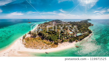 Beautiful tropical sea of Lipe Island with coral reef and traditional boat by the beach in summer at Thailand 119971525