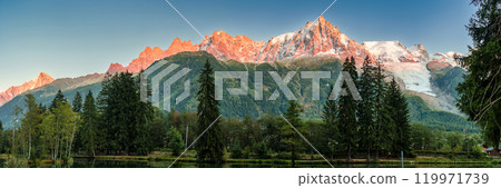 View of sunset over Lac des Gaillands with Mont Blanc massif in Chamonix town at France View of sunset over Lac des Gaillands with Mont Blanc massif in Chamonix town at France 119971739
