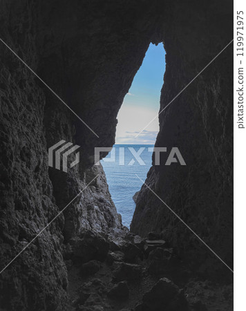 Narrow hole in the cave, an exit from the dungeon 119971975