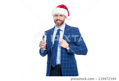 Businessman at holiday. Businessman drink champagne in Christmas party. Celebrate New Year. Merry Christmas. Business man in Santa Claus hat celebrating and cheering. Party fun. Happy New Year 119972594