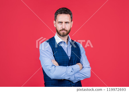good looking man in fashionable business wear crossed hands, confidence good looking man in fashionable business wear crossed hands, confidence 119972693