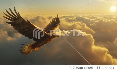 Majestic eagle soaring above the clouds at sunrise with golden light illuminating the sky 119972884