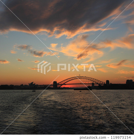 Skyline of Sydney and harbour bridge at sunset, Australia. 119973154