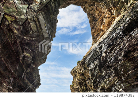 cave, coast, rock 119974392