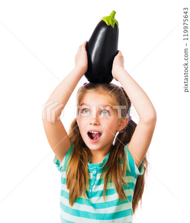 little girl with eggplant on head 119975643