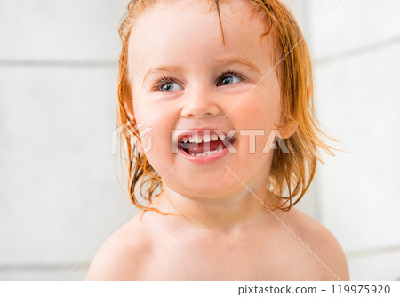 Portrait of beautiful smiling baby in bathroom 119975920