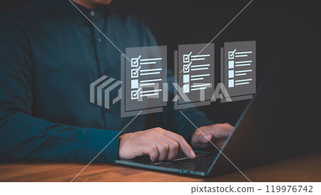 Male accountant showing office document auditing concept. Business performance checklist, filling out digital form checklist, take an assessment, questionnaire, evaluation, online exam. Male accountant showing office document auditing concept. Business performance checklist, filling out digital form checklist, take an assessment, questionnaire, evaluation, online exam. 119976742