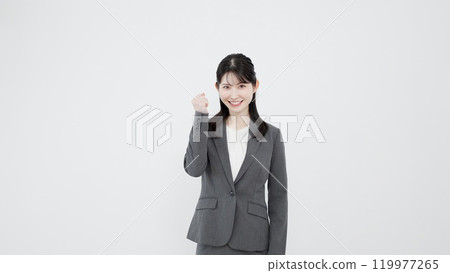 Asian business woman doing guts pose 119977265