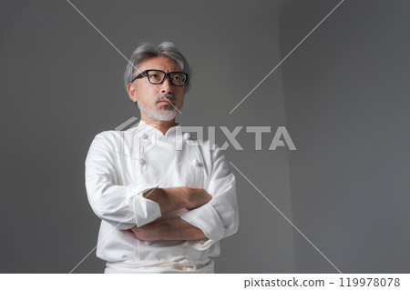 A chef with arm-strokes A chef with arm-strokes 119978078