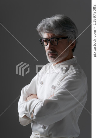 A chef with arm-strokes A chef with arm-strokes 119978098